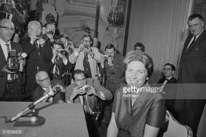 smiles for photographers at her press conference April 26.